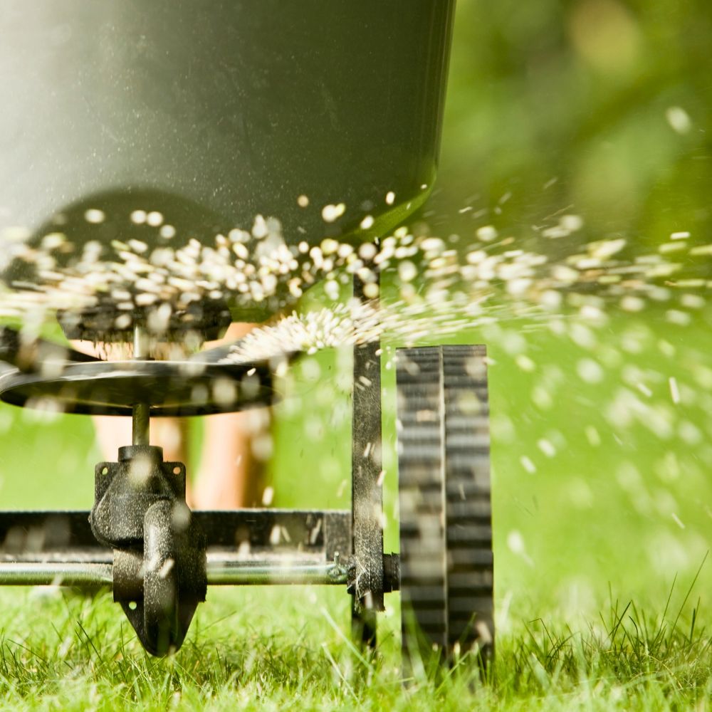a lawn being fertilized with liquid